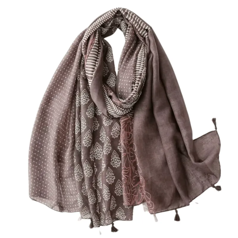 Elegant Multi-Pattern Tassel Scarf in Earthy Tones sold by Zulily