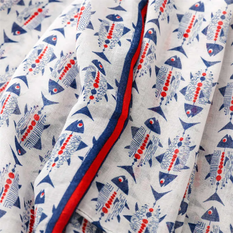 Navy and Red Scandinavian Fish Scarf with Tassels sold by Zulily product image thumbnail 3