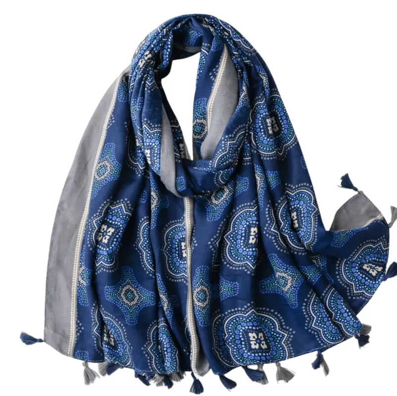 Rich Blue Geometric Scarf with Tassels sold by Zulily