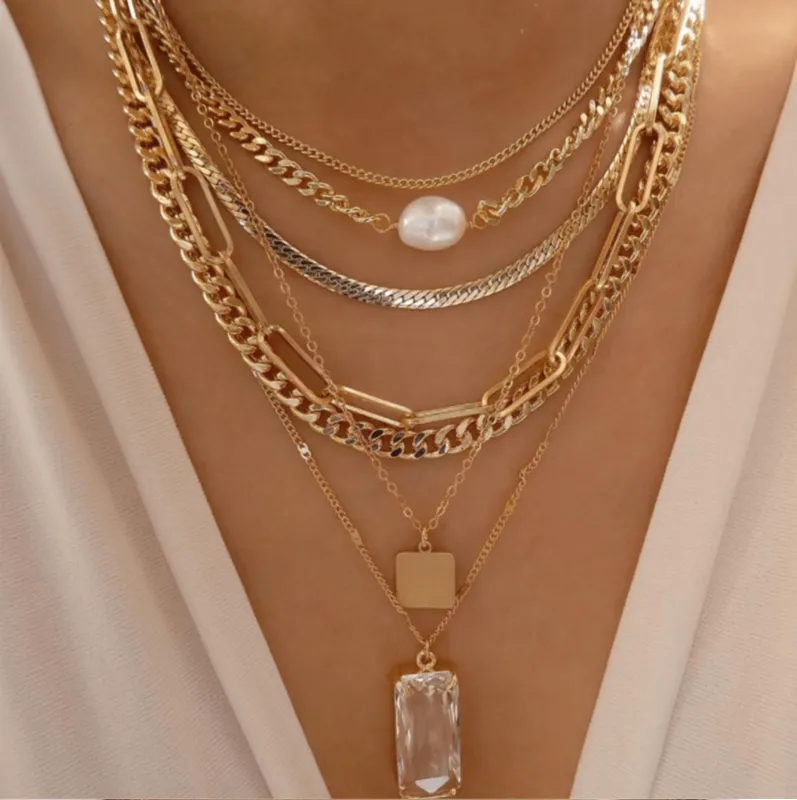 Layered Goldtone Necklace with Rectangular Crystal Pendant and Pearl Solitaire sold by Zulily