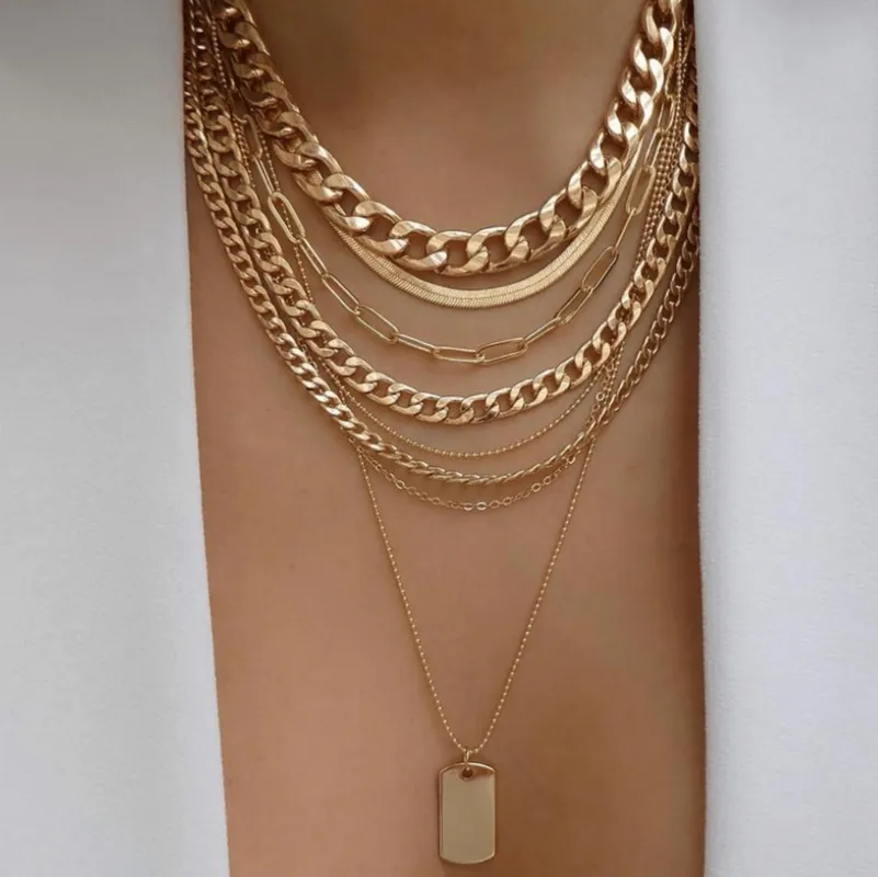 Goldtone Rope, Omega And Curb Multi Layered Necklace With Dog Tag Pendant sold by Zulily