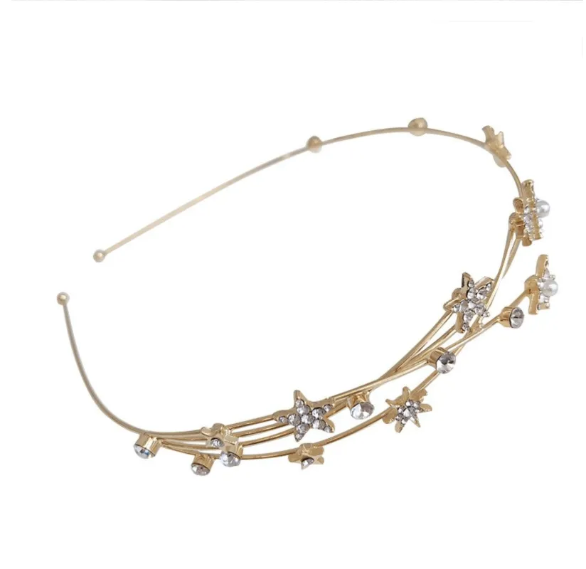 Goldtone Star And Crystal Hair Band sold by Zulily