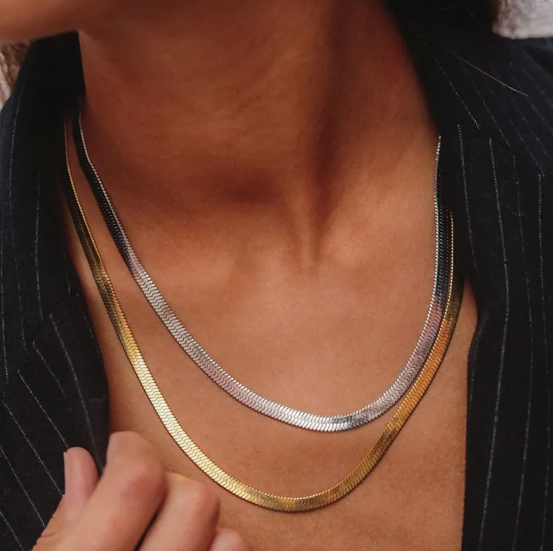 Silver And Goldtone Herring Bone Necklace Set sold by Zulily