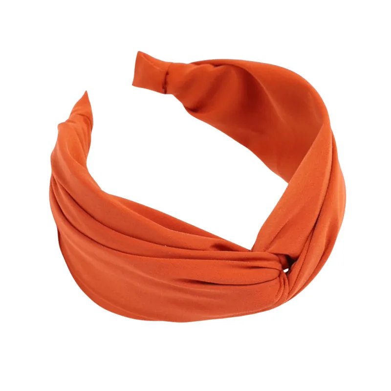 Orange Twisted Headband sold by Zulily