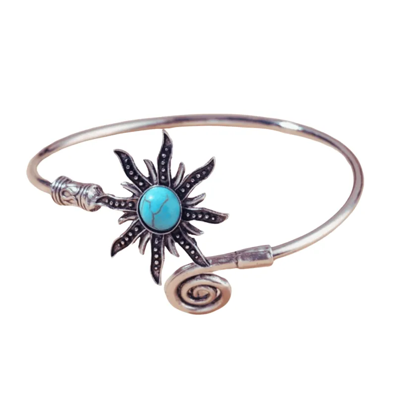 Silvertone Faux Turquoise Sun Swirled Bangle Bracelet sold by Zulily