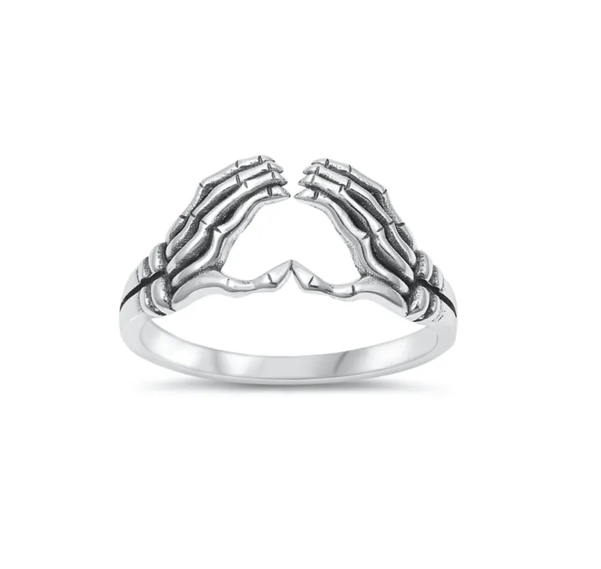 Sterling Silver Skeleton Hands Ring sold by Zulily