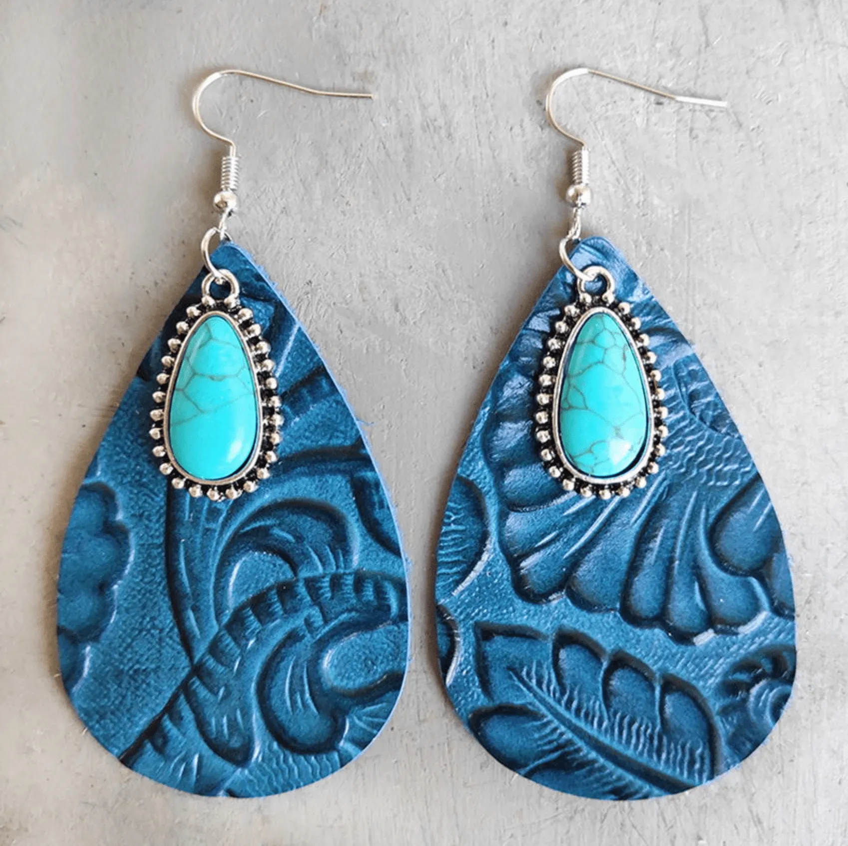 Blue Leather and Multi Colored Patterned & Turquoise Teardrop Drop Earrings sold by Zulily