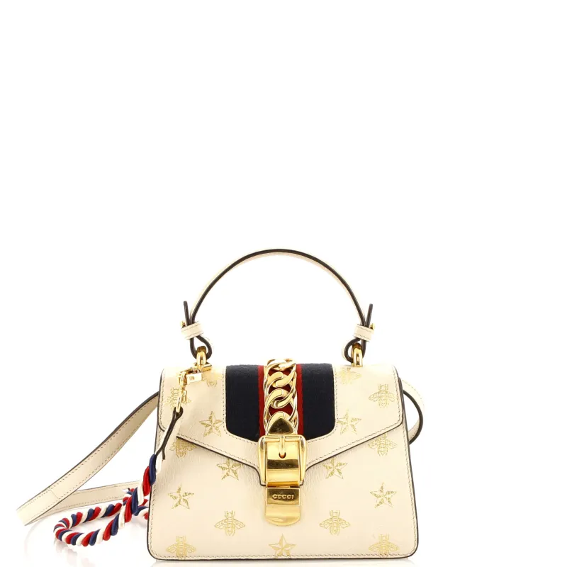 Pre-Loved Gucci Sylvie Top Handle Bag Printed Leather Mini sold by Zulily