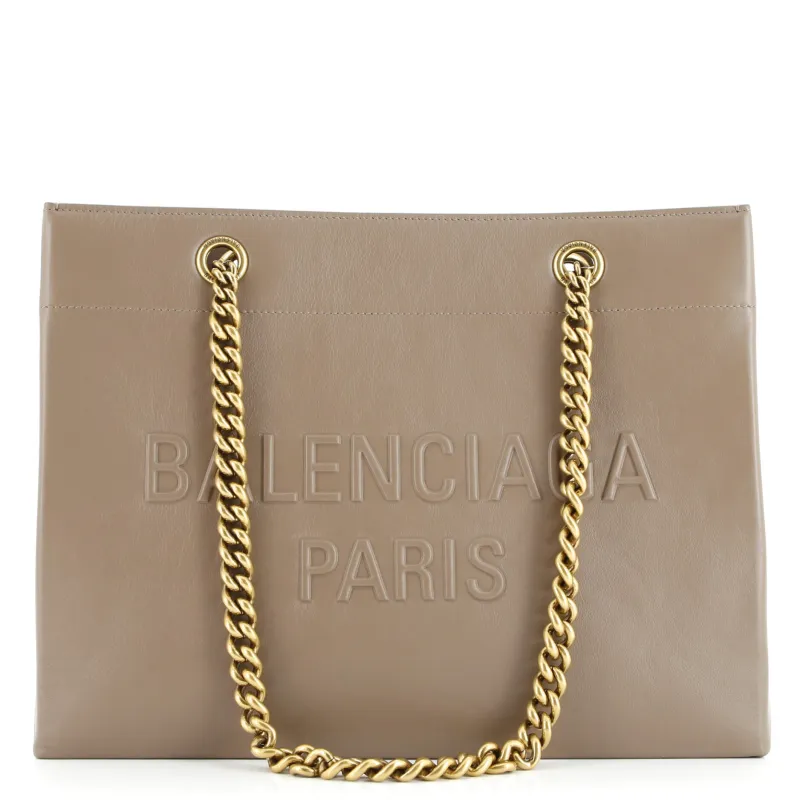 Pre-Loved Balenciaga Duty Free Chain Tote Leather Medium sold by Zulily