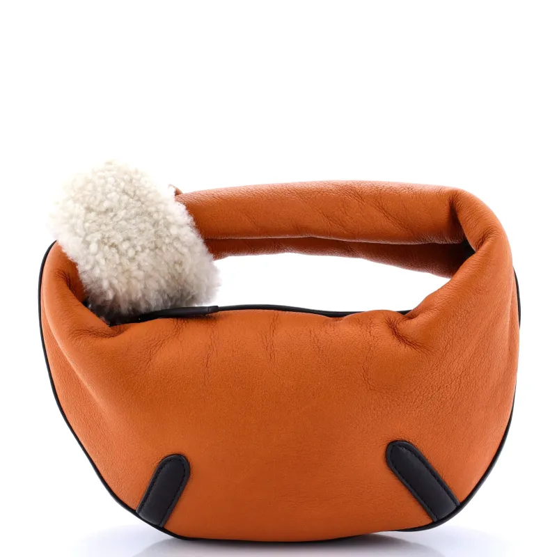 Pre-Loved Bottega Veneta Aviator Jodie Hobo Leather with Shearling Mini made by Bottega Veneta