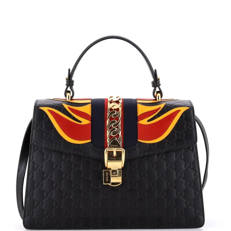 Pre-Loved Gucci Sylvie Top Handle Bag Guccissima Leather with Applique Medium sold by Zulily
