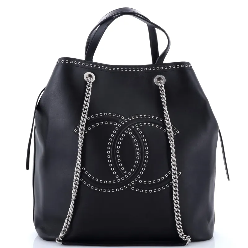 Pre-Loved Chanel Coco Eyelets Shopping Tote Calfskin Large sold by Zulily