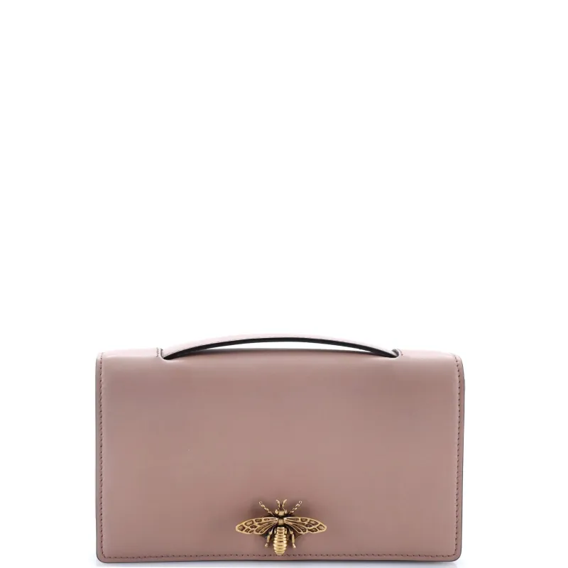 Pre-Loved Christian Dior Bee Clutch Leather sold by Zulily