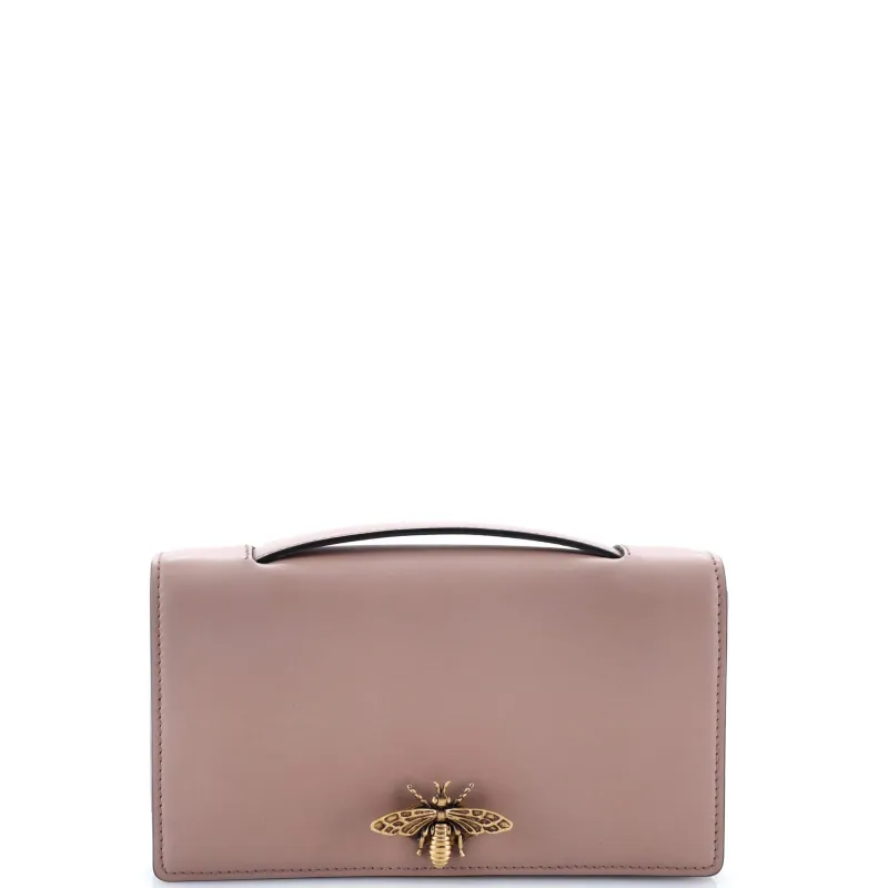 Pre-Loved Christian Dior Bee Clutch Leather sold by Zulily