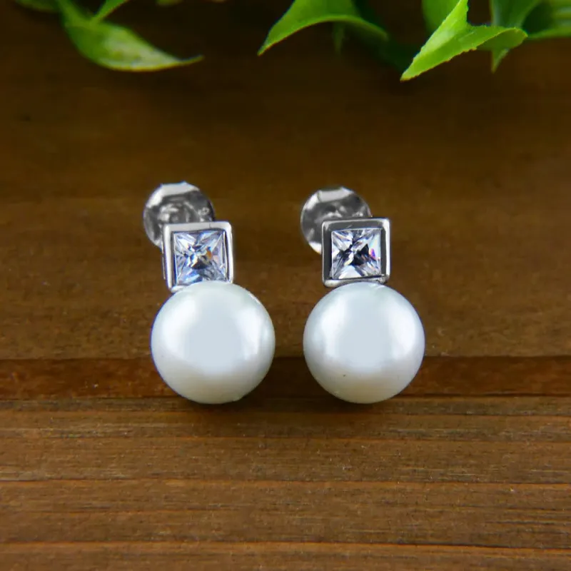 Vera & Co Women's Sterling Silver Faux White Pearl and CZ Post Earring sold by Zulily