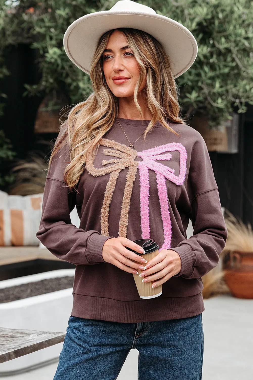 Callie Terry Bow Pattern Drop Shoulder Sweatshirt by Threaded Pear sold by Zulily