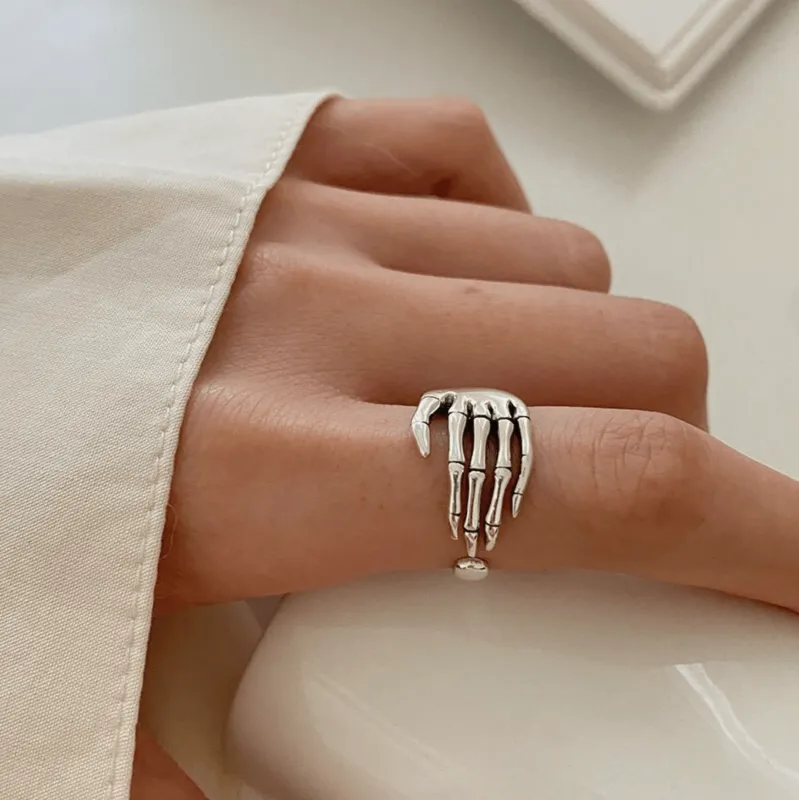 Adjustable Silvertone Skeleton Hand Ring sold by Zulily