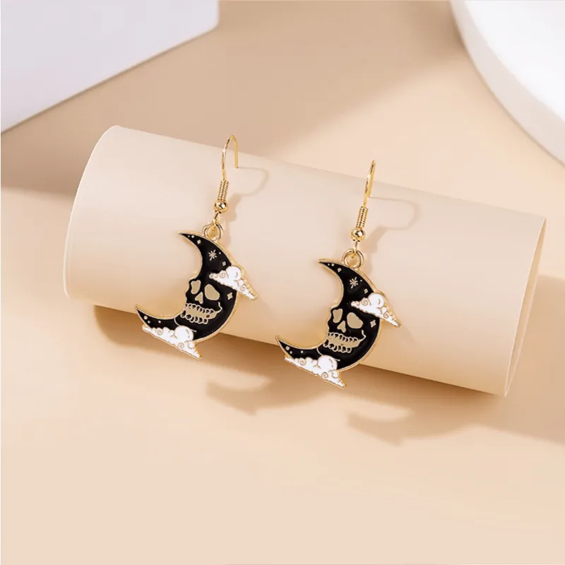 Black Skeleton Crescent Moon Drop Earrings sold by Zulily