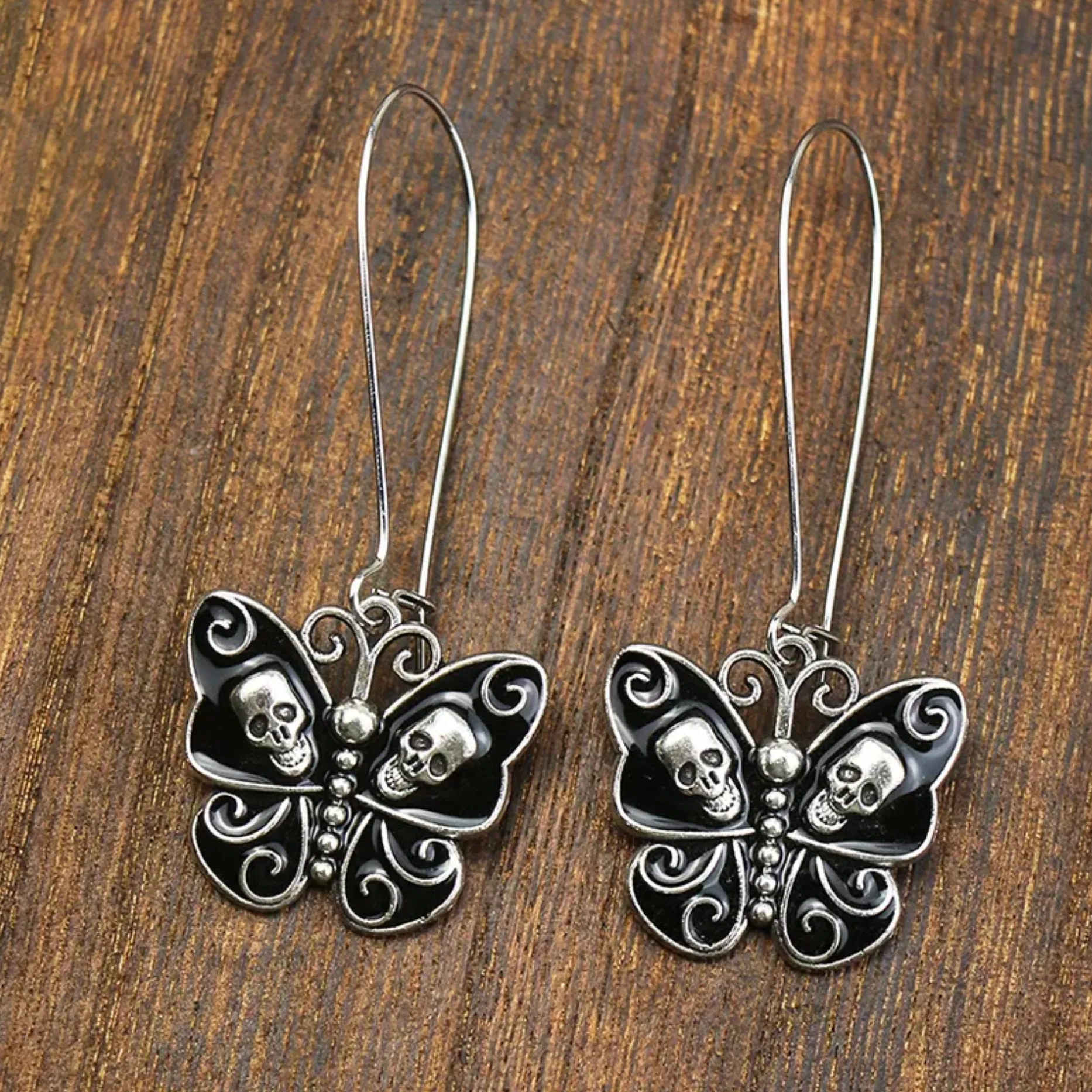 Black Skull Butterfly Earrings sold by Zulily product image thumbnail 2
