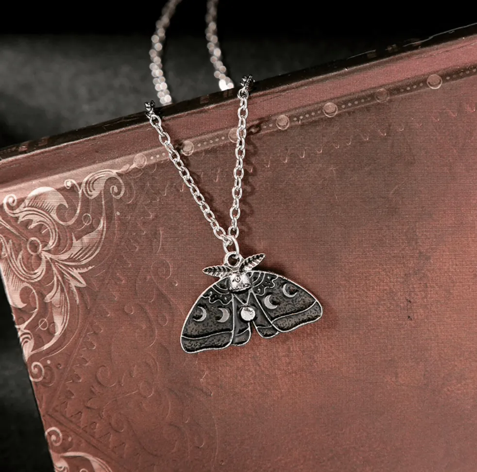 Silvertone Black Lunar Moth Necklace sold by Zulily product image thumbnail 4