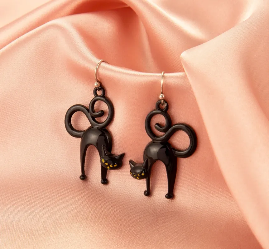 Black Spooky Cat With Swirled Tail Drop Earrings sold by Zulily
