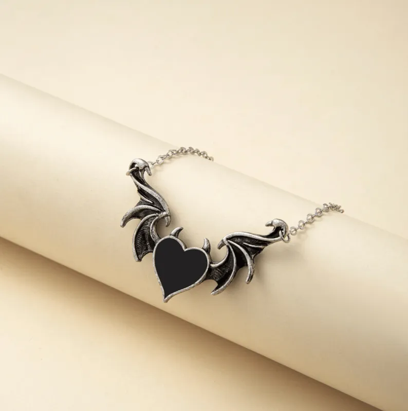Silvertone Black Winged Heart Pendant Necklace sold by Zulily