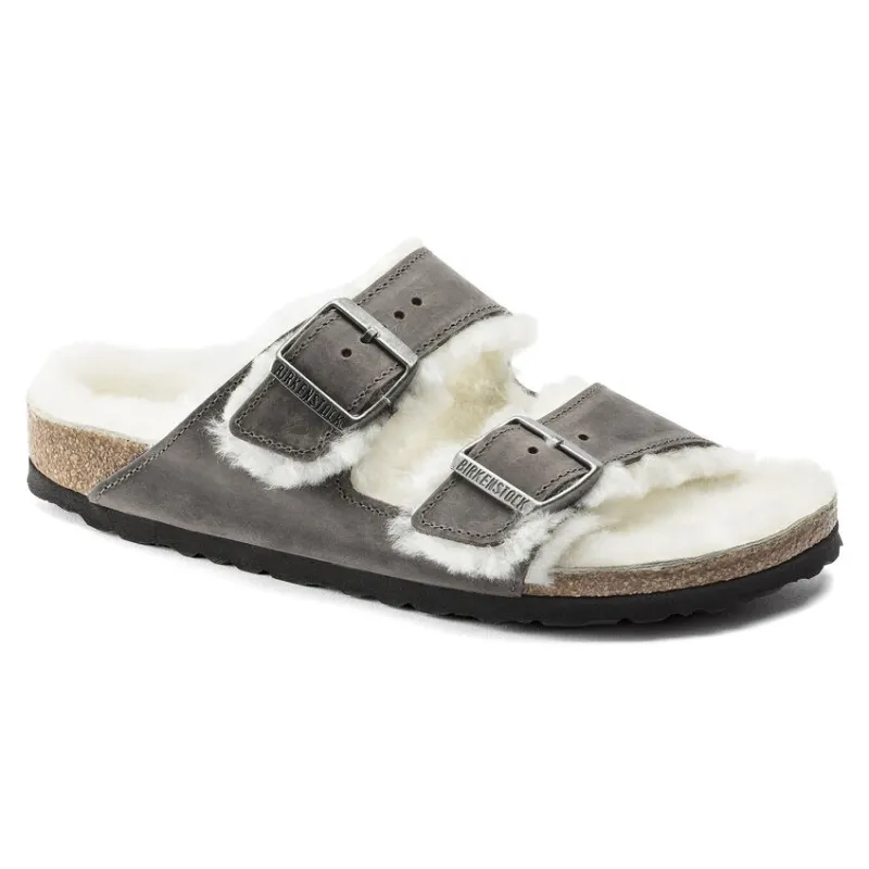 Birkenstock Arizona Black Shearling Waxy Leather Iron sold by Zulily