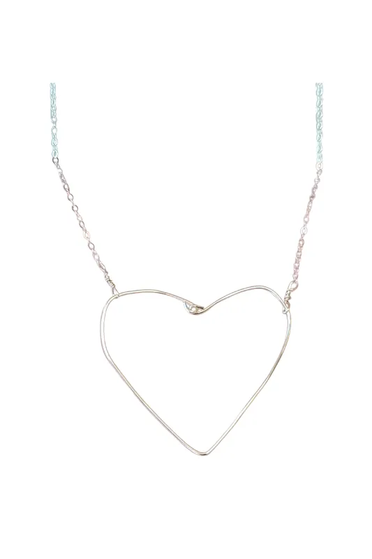 Simple Heart Necklace in Silver sold by Zulily