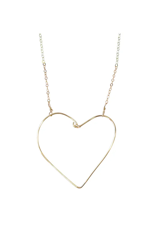 Simple Heart Necklace in Gold sold by Zulily