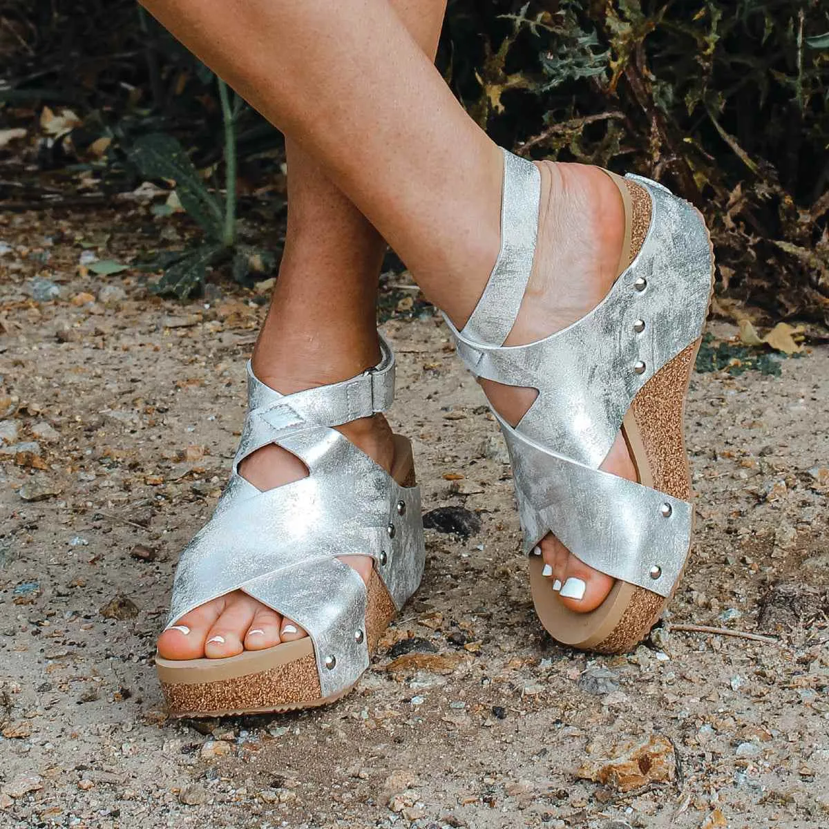 JAMBOREE FAUX LEATHER WEDGE SANDAL WITH SLING BACK sold by Zulily