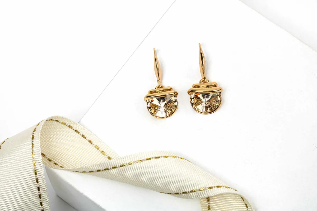 Gold Silk Swarovski Crystal Earrings – Gold Spring Drop Crystal Earrings sold by Zulily