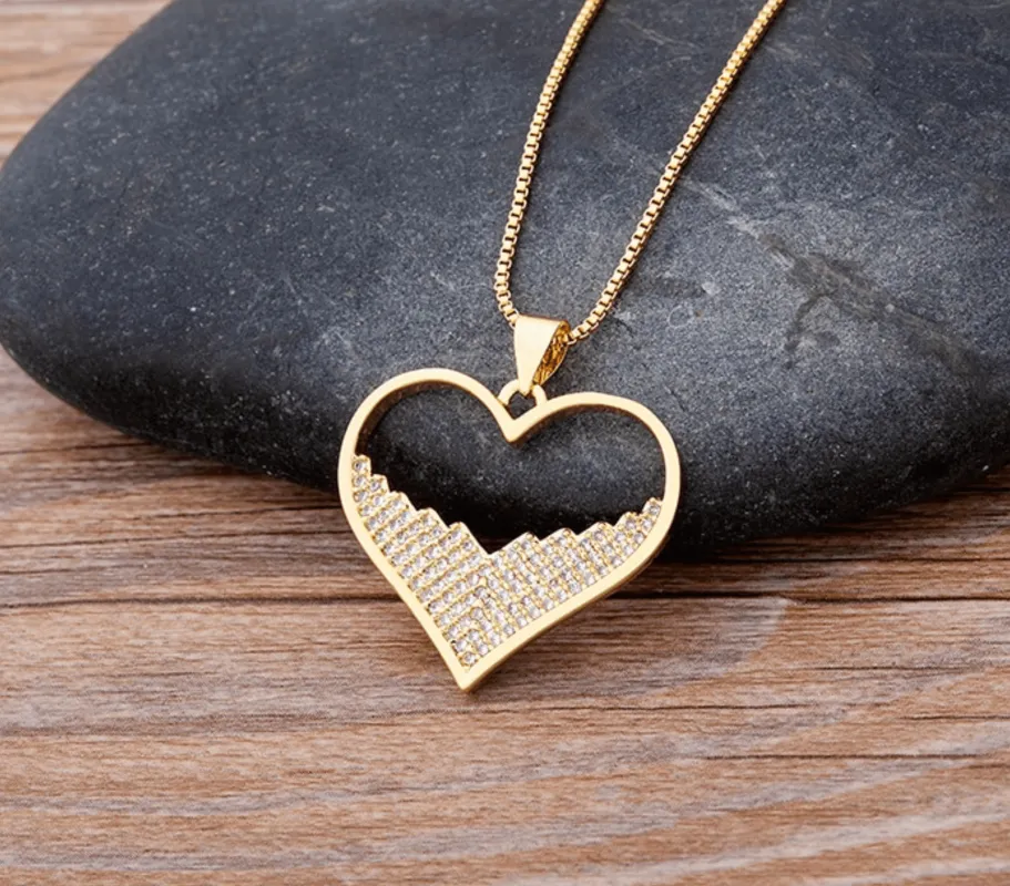 Goldtone Heart Pendant Necklace With Half Cubic Zirconia In Clear sold by Zulily