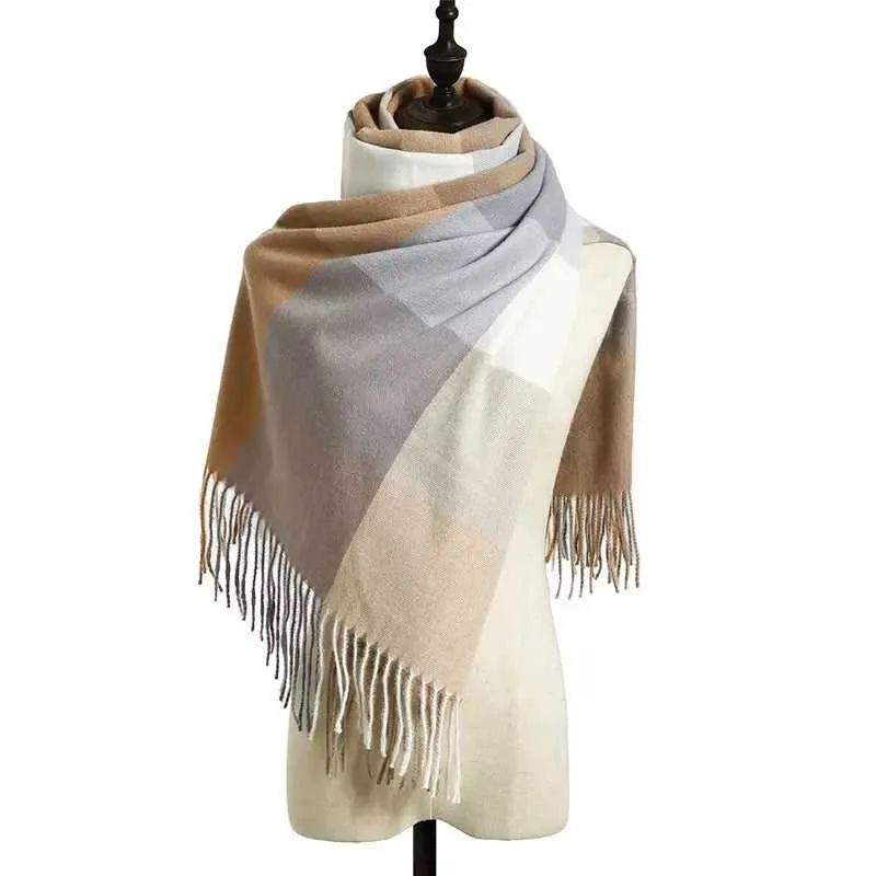 Cosy Plaid Scarf With Tassels in Beige Sand sold by Zulily