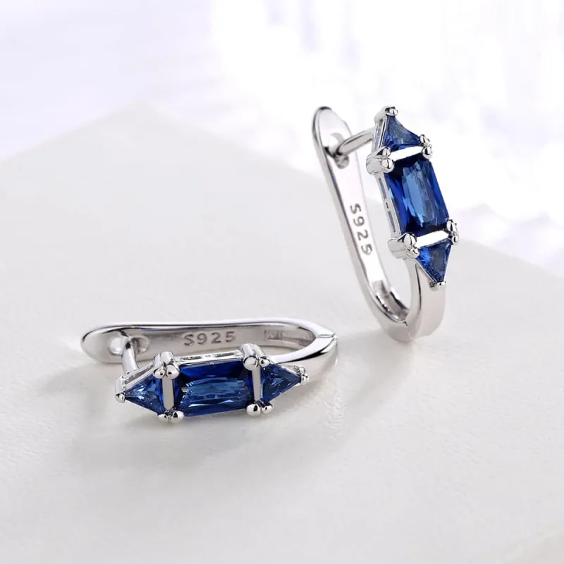 Amy and Annette Emerald Sterling Silver Huggie earings sold by Zulily