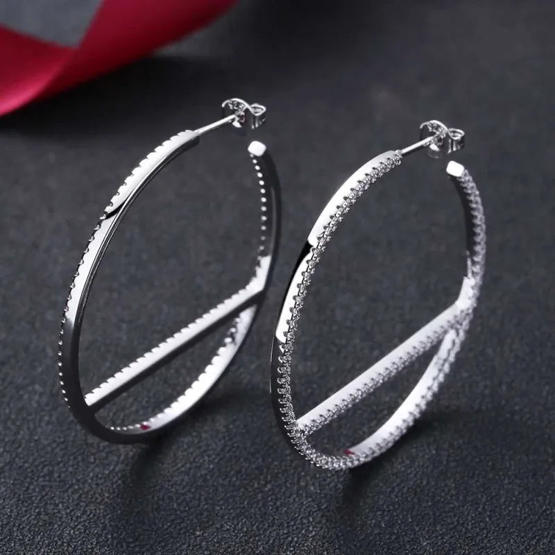 Amy and Annette 14K Gold Hoop Earring with posts and Crystals from Swarovski sold by Zulily