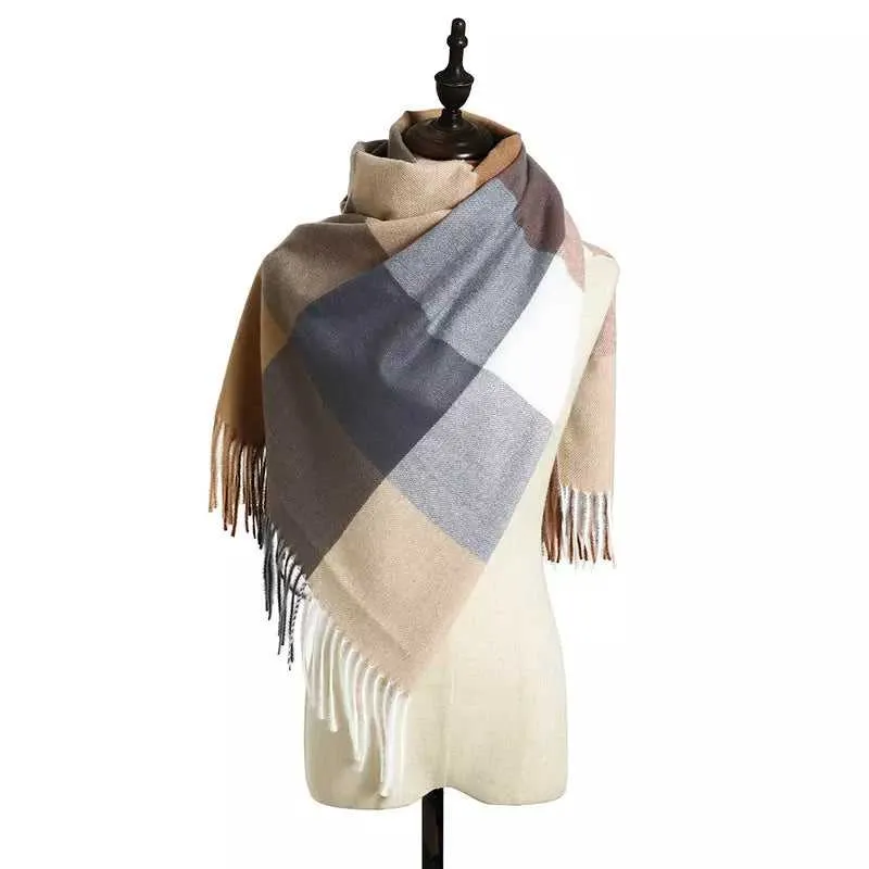 Cosy Plaid Scarf With Tassels in Grey Steel sold by Zulily