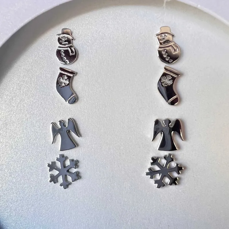 Sterling Silver Holiday Earring Set of Plain Silver Snowman Stud, Stocking Stud, Angel Stud, Snowflake Stud sold by Zulily