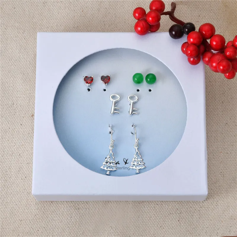 Sterling Silver Holiday Earring 4- pair Set of Star Crawler, Angel Wing, Snowman, Rose Quartz round stud sold by Zulily