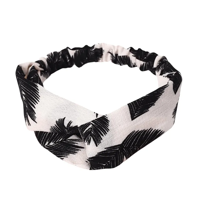 Black White Palm Leaves Twisted Headband sold by Zulily