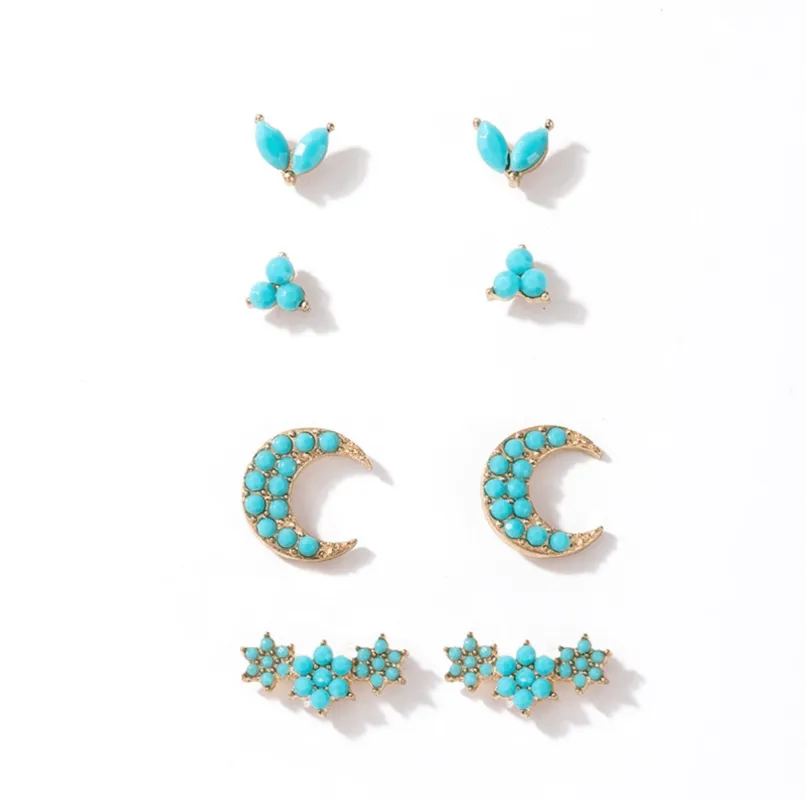 Goldtone Turquoise Crescent Moon Triplet Set Of 4 Stud Earrings sold by Zulily
