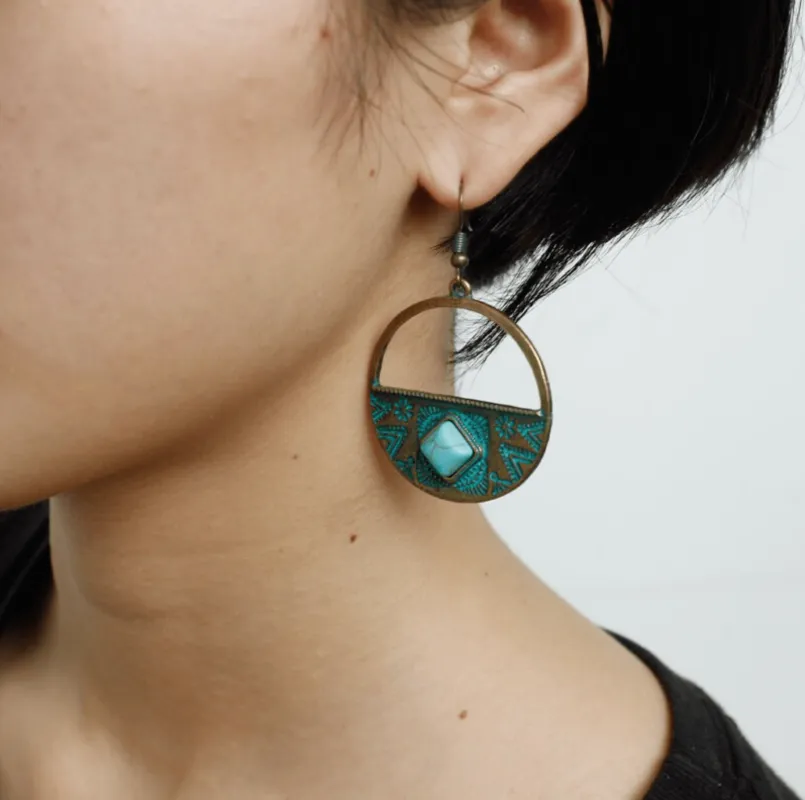 Goldtone & Turquoise Semi-circle Patterned Earrings sold by Zulily