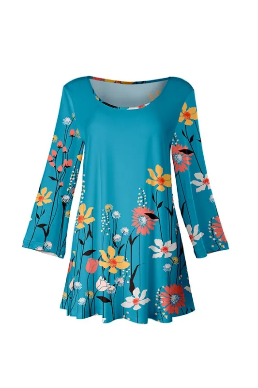 Lily by Firmiana Women’s Long Sleeve Scoop Neck Flared Hem Tunic Blue Floral Print with Coral Accents sold by Zulily