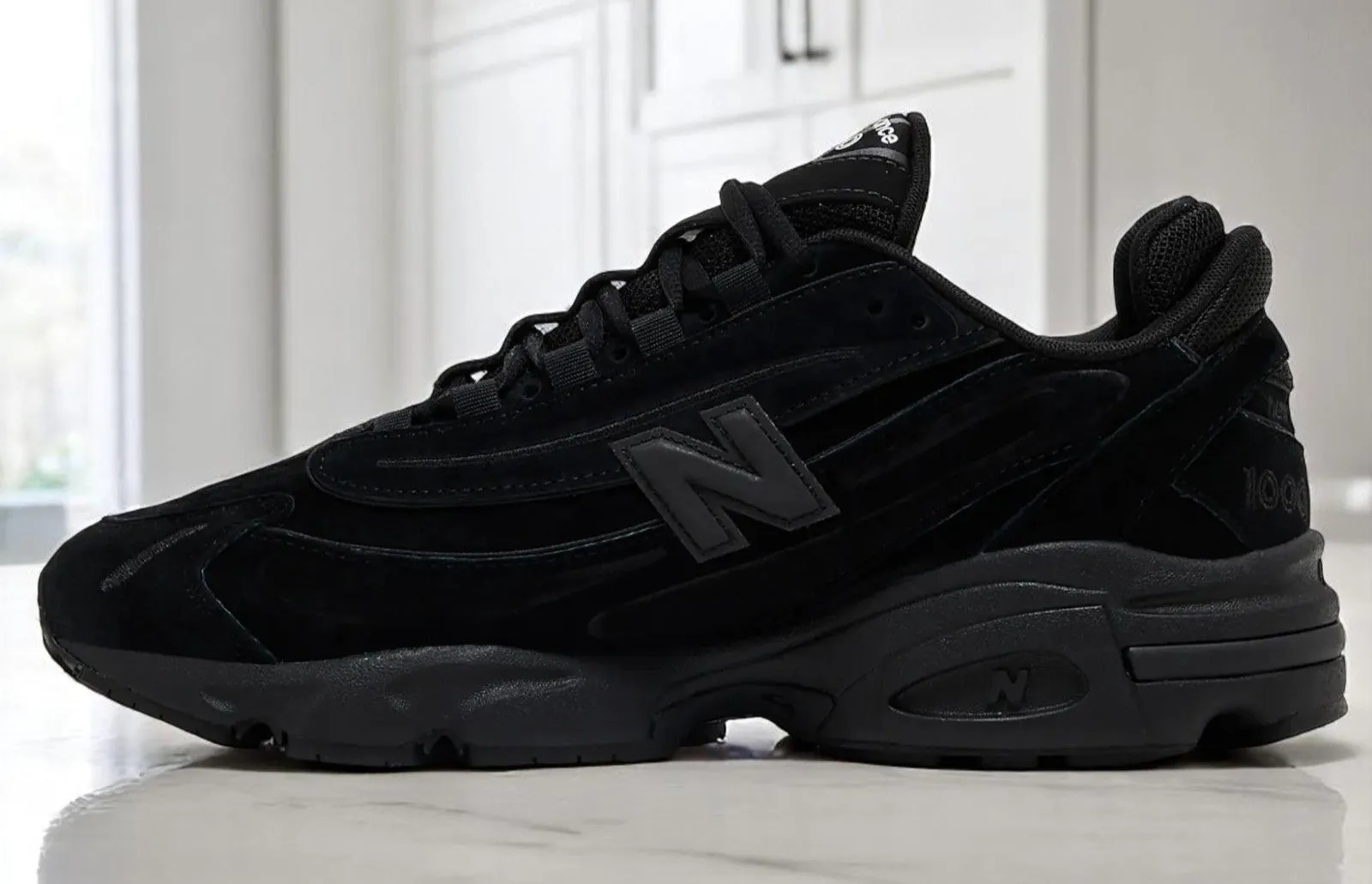 Men's New Balance 1000 'Black Cat' sold by Zulily product image thumbnail 3