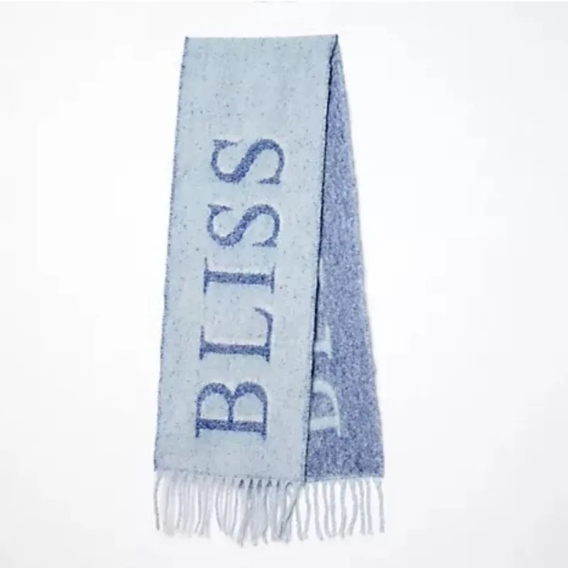 Sprigs Oversized Woven Fringe Scarf with Word Design sold by Zulily