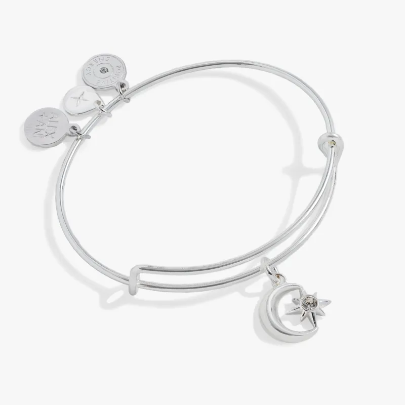 Star and Moon Charm Bangle sold by Zulily