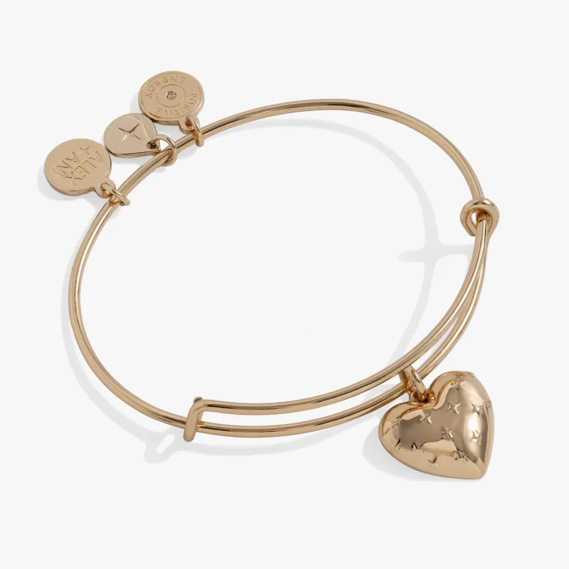 Gold Metal Heart Charm Bangle sold by Zulily