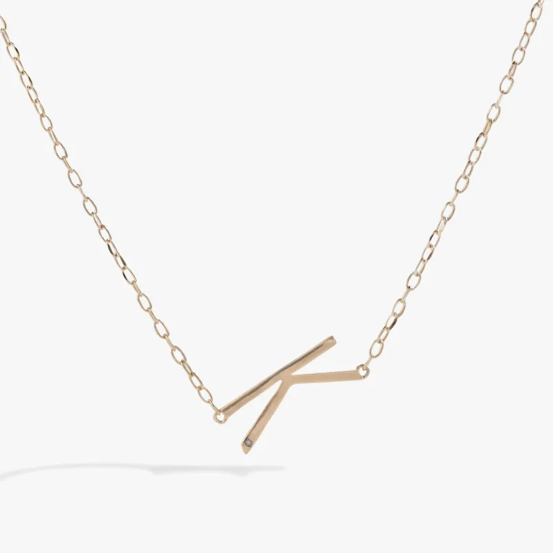 Initial K Precious Elongated Necklace sold by Zulily