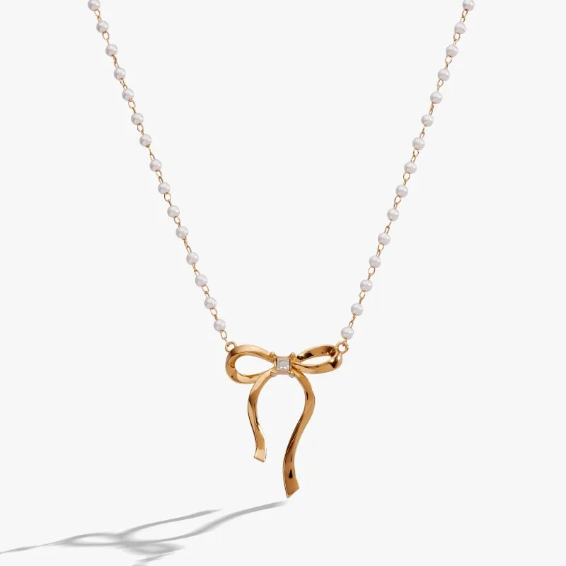 Bow Pearl Coquette Necklace sold by Zulily