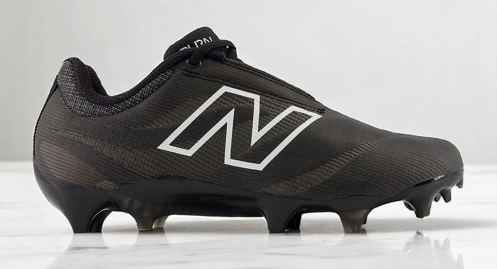 New Balance Women's Burn X4 'Black White' sold by Zulily