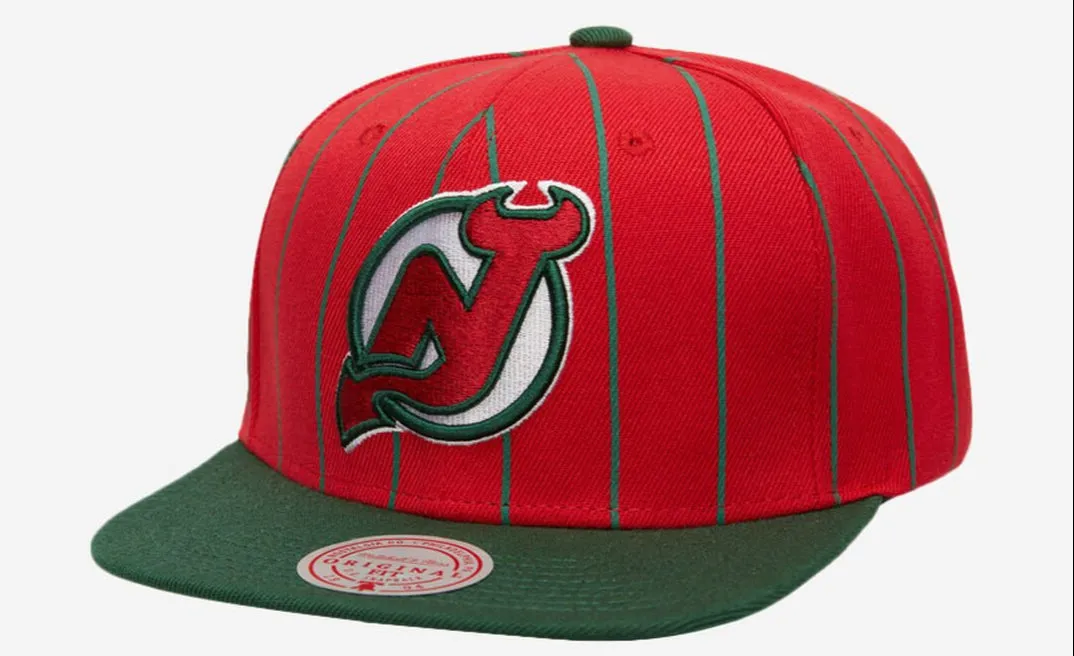 Mitchell & Ness Men's NHL Team Pin Snapback Devils Snapback Caps sold by Zulily